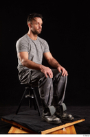  Larry Steel  1 boots dressed grey camo trousers grey t shirt shoes sitting whole body 0006.jpg